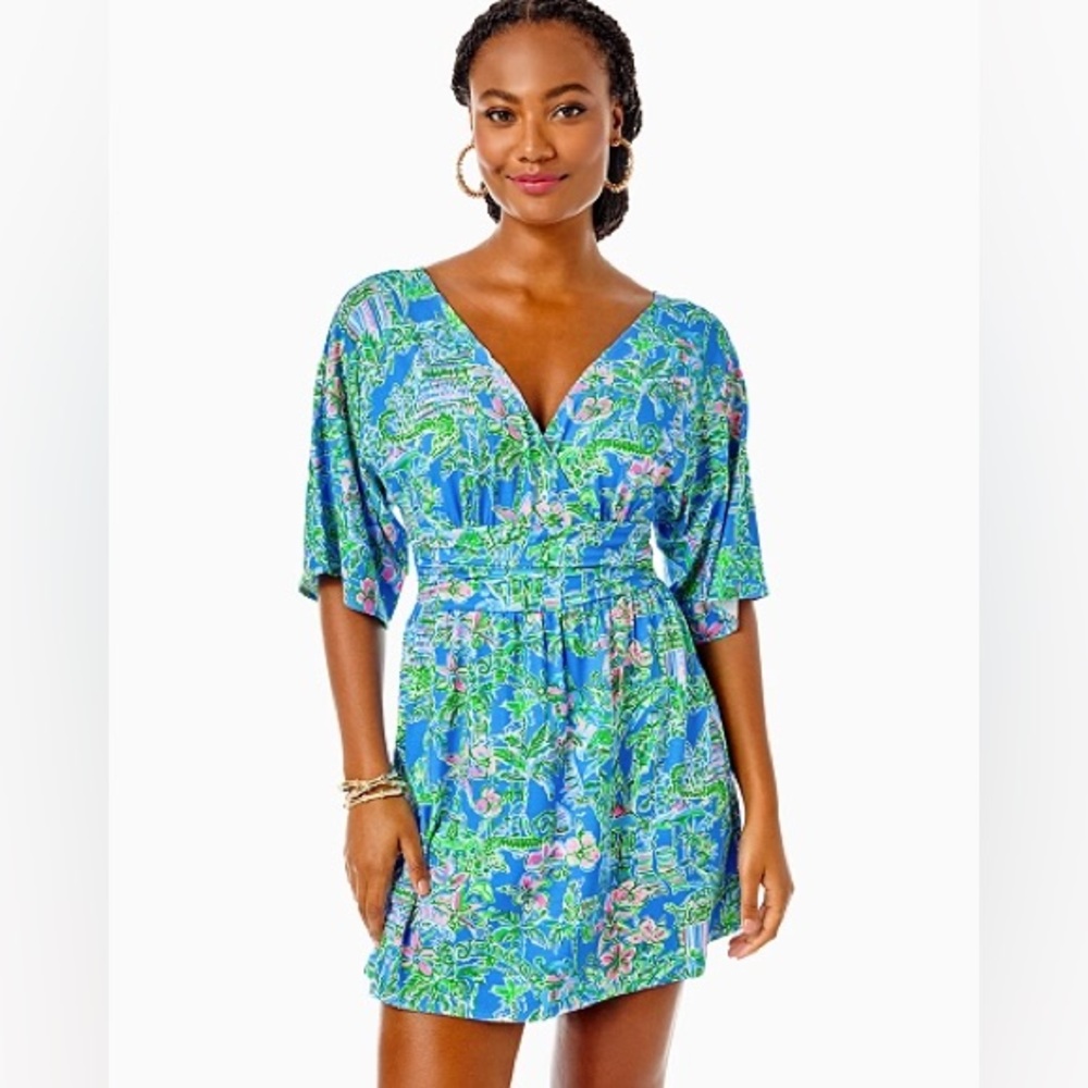 PARIGI SKORT ROMPER IN BOCA BLUE BENEATH THE BOUGAINVILLEA